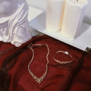 Gold necklace and bracelet set